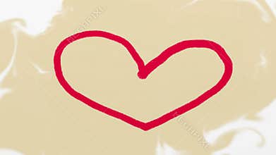 Hand drawn red heart on beige background