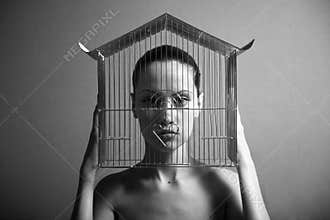 Surrealistic woman with cage