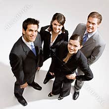 Co-workers standing in group