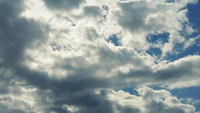 Huge Clouds Above Lit Up By Sun