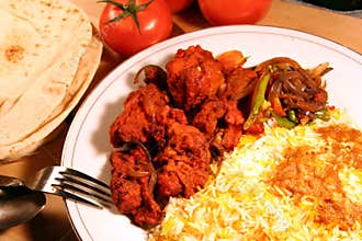 Indian meal biryani food with chicken masala and s