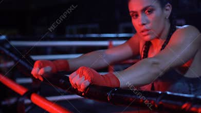 Brunette strong fitness woman at the gym