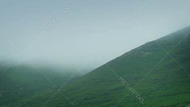 Thick Mist Moving Over Hills
