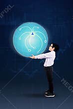 Boy bringing 3d globe