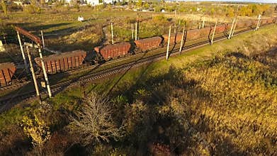 Rise above the drone of a freight train, freight train with a height of drone flights over the freight train.
