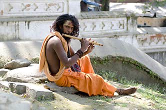Holy man with flute