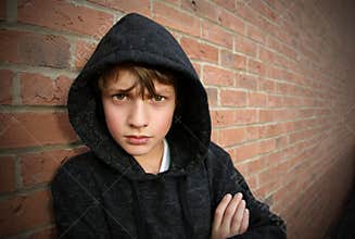 Boy in hooded top