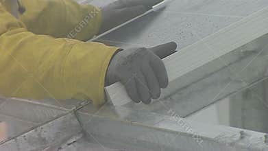 Close up of Installation of solar panels in adverse conditions