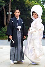 Married couple with traditional costumes before a Japan wedding