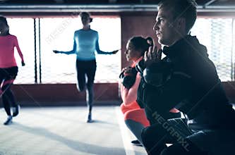 Group of people doing fitness exercise