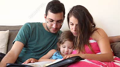 Family Reading the Bible Together