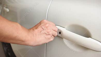 Using Key To Unlock And Open Cars Door