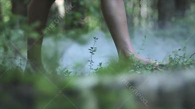 Bare Feet Of A Young Woman