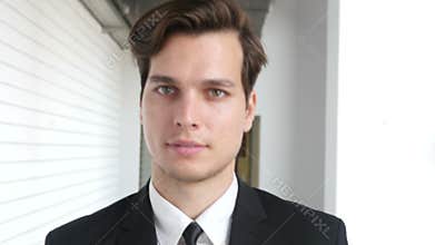 Walking Businesman Coming Out from Office Cabinet