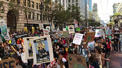 Sep 20, 2019 San Francisco / CA / USA - Protesters carrying placards and banners at the Climate Strike Rally and March