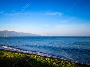 Morning Sun On The Seawater Of Tropical Beach At The Village At Umeanyar Village