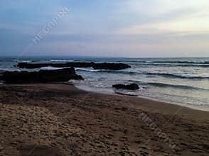 Natural Beach Scenery In The Evening At Batu Bolong Beach