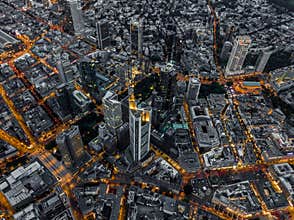 Aerial Overhead View of Frankfurt am Main, Germany Skyline at Night with glowing Streets