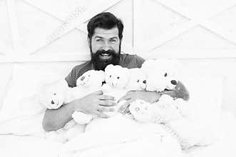 Back into childhood. Happy birthday. Man with beard happy face hold gift toys. Toys shop. Bachelor day. Childish Habits
