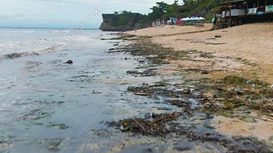 Environment Problem. Ocean Beach After Storm. Sea Coast Covered With Plastic Waste, Trash, Garbage, Solid Rubbish