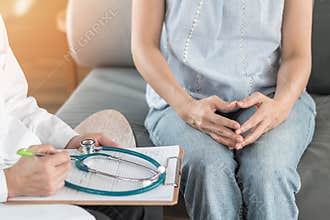 Doctor or psychiatrist consulting and diagnostic examining stressful woman patient on obstetric - gynecological female illness