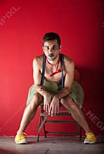 Performer seated backstage