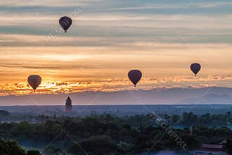 Balloons over Bagan with viewing tower, Myanm