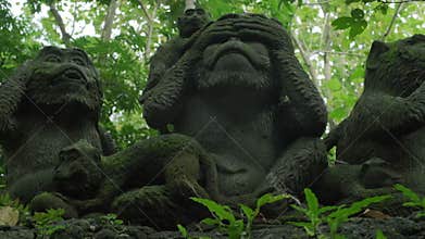 Three wise monkeys Asian stone statue