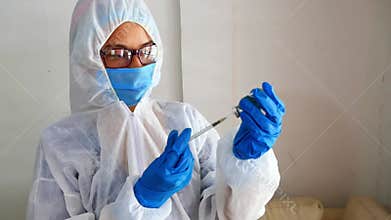 COVID-19, Crown virus or new epidemic coronavirus disease with a physician or scientific laboratory technician in the PPE Personal