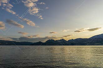 Cloudy sky seen from the shore of Okanagan lake at morning British Columbia Canada