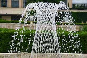 Unique pattern of a water fountain splash into the air