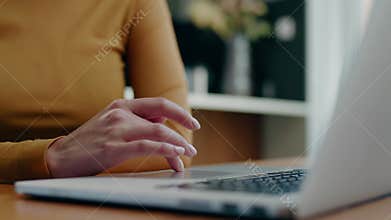 Female work from home on laptop .