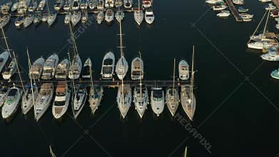 Sailboats in the Harbour of small town on Malta Island, Aerial tilt down view