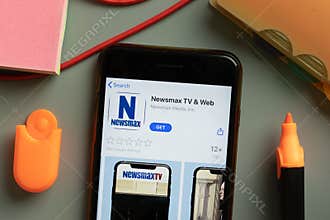 New York, USA - 29 September 2020: Newsmax TV web mobile app logo on phone screen close up, Illustrative Editorial