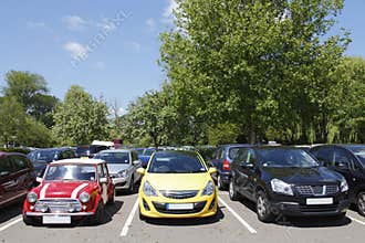 New and old parked cars