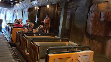 People waiting for a rollercoaster to take off