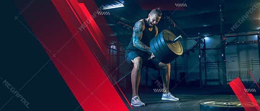 The male athlete training hard in the gym. Fitness and healthy lifestyle concept. Flyer.