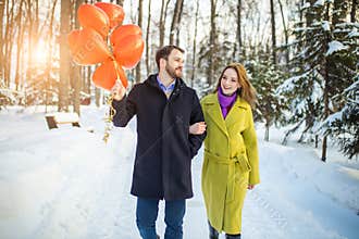 Lovely couple walk at winter street, romantic date