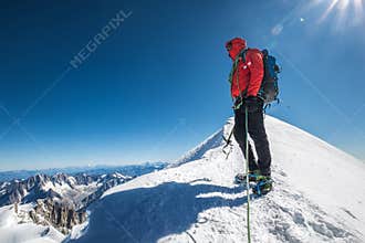 Last steps before Mont Blanc Monte Bianco summit 4,808 m of rope team man with climbing axe dressed mountaineering clothes,