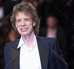 Mick Jagger walks the red carpet