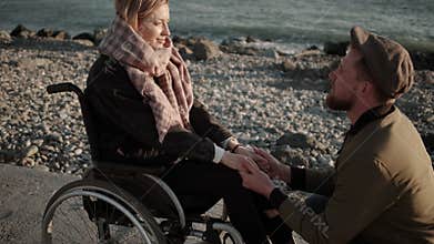 Man expressing love to his handicapped girlfriend