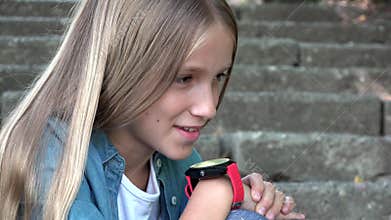 Smart Watch, Child Using Smartwatch Outdoor in Park, Kid Talking at Smartphone
