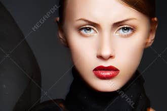 Glamour woman model with chic make-up & silk scarf