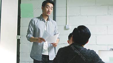 Team of asian business people meeting in company