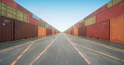 Endless stacks of cargo shipping containers under blue sky