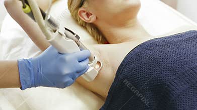 Epilation armpit in medical center.
