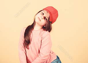 Little girl wearing bright baseball cap. Modern fashion. Kids fashion. Stylish accessory. Feeling confident with this