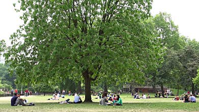 London James`s Park, People Tourists Relaxing Resting on Grass at Picnic