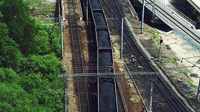 Rail: a train loaded with coal goes on rails