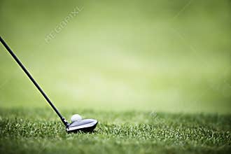 Golf background with driver and ball.